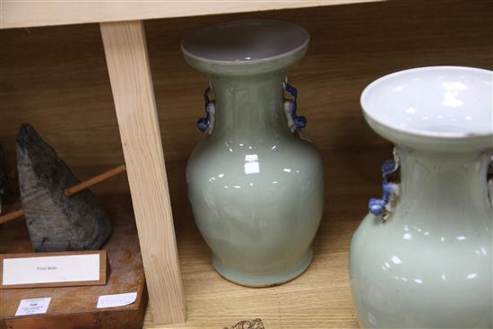 A pair of Chinese underglaze blue and white slip celadon glazed vases, H.35cm